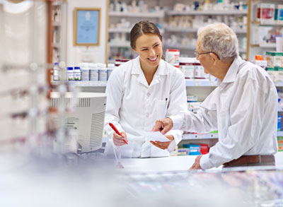 Pharmacist Helping Customer