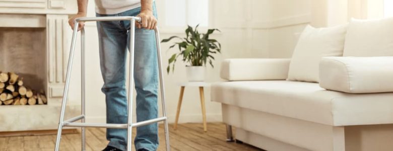 Patient using walker to move around home